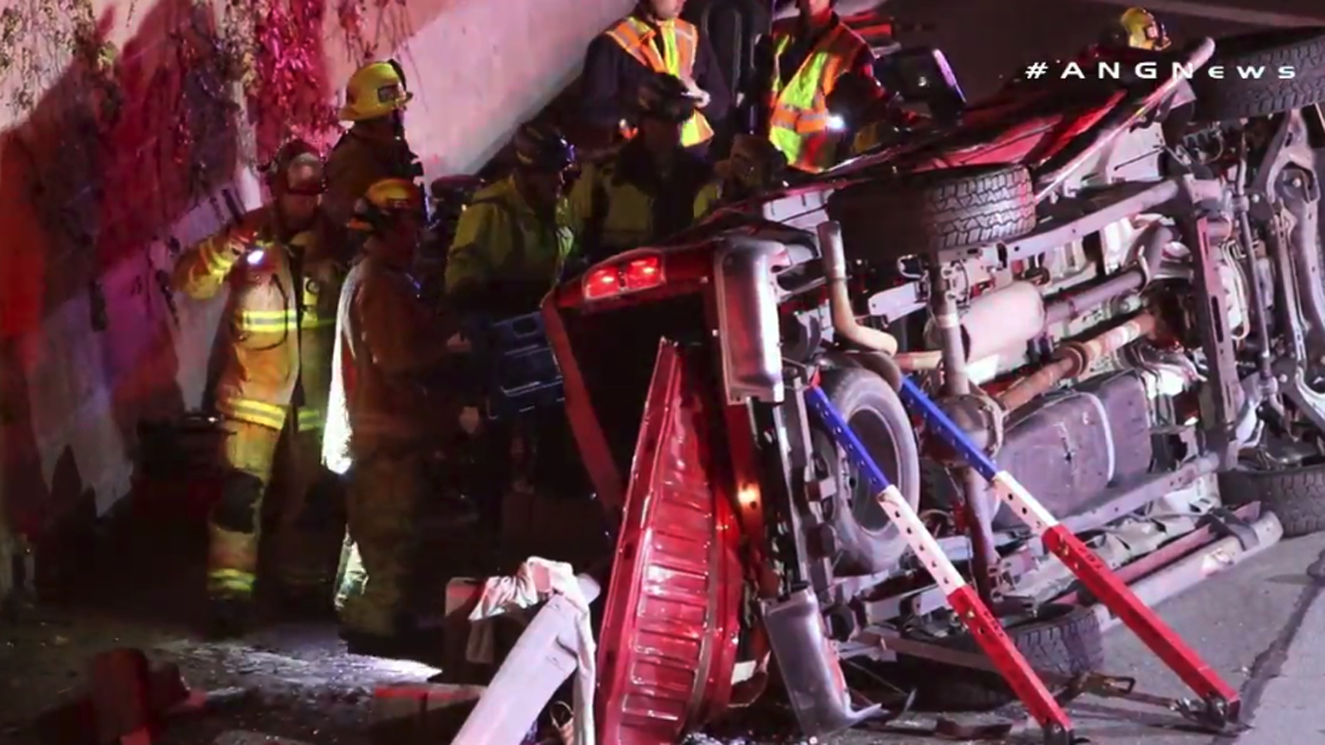 A vehicle overturned in a four-vehicle crash on the 22 Freeway in Garden Grove on Jan. 1, 2019. (Credit: AMGNews)