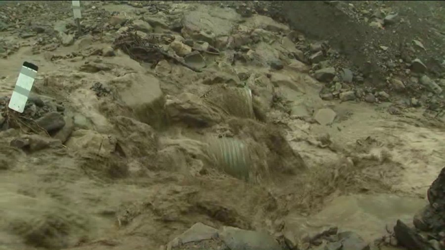 A drain is seen amid an inundated creek in Los Angeles on Jan. 17, 2019. (Credit: KTLA)