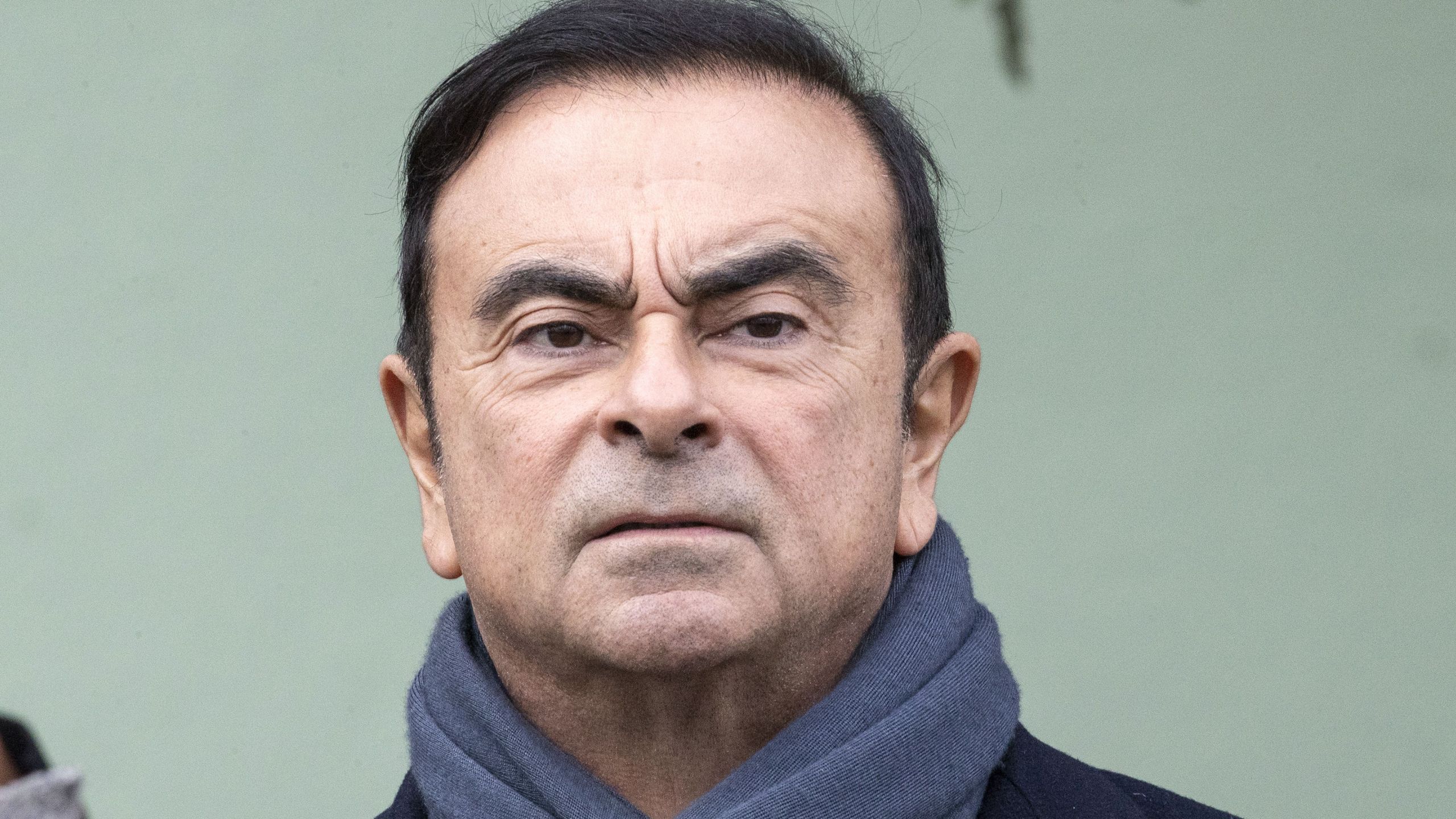 Nissan chairman Carlos Ghosn waits for the French President Emmanuel Macron to arrive for a visit of the Renault factory in Maubeuge northeastern France on Nov. 8, 2018. (Credit: Etienne Laurent/AFP/Getty Images)