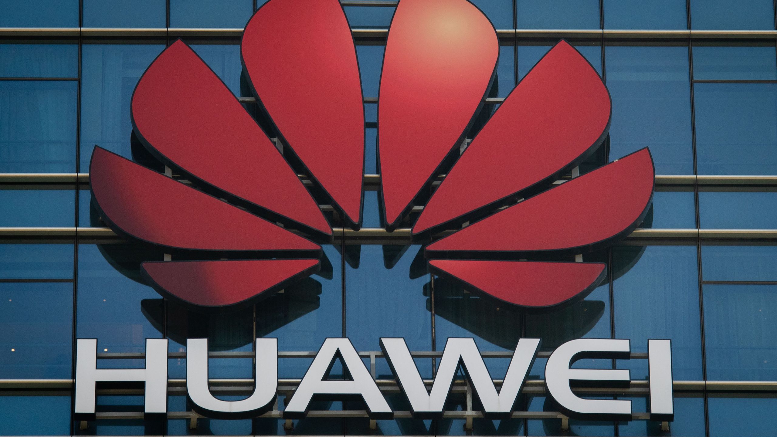 The Huawei logo stands on a Huawei office building in Dongguan in Chinas southern Guangdong province on Dec. 18, 2018. (Credit: NICOLAS ASFOURI/AFP/Getty Images)