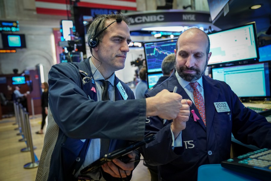 Traders and financial professionals work on the floor of the New York Stock Exchange (NYSE) ahead of the opening bell, January 4, 2019 in New York City. (Credit: Drew Angerer/Getty Images)