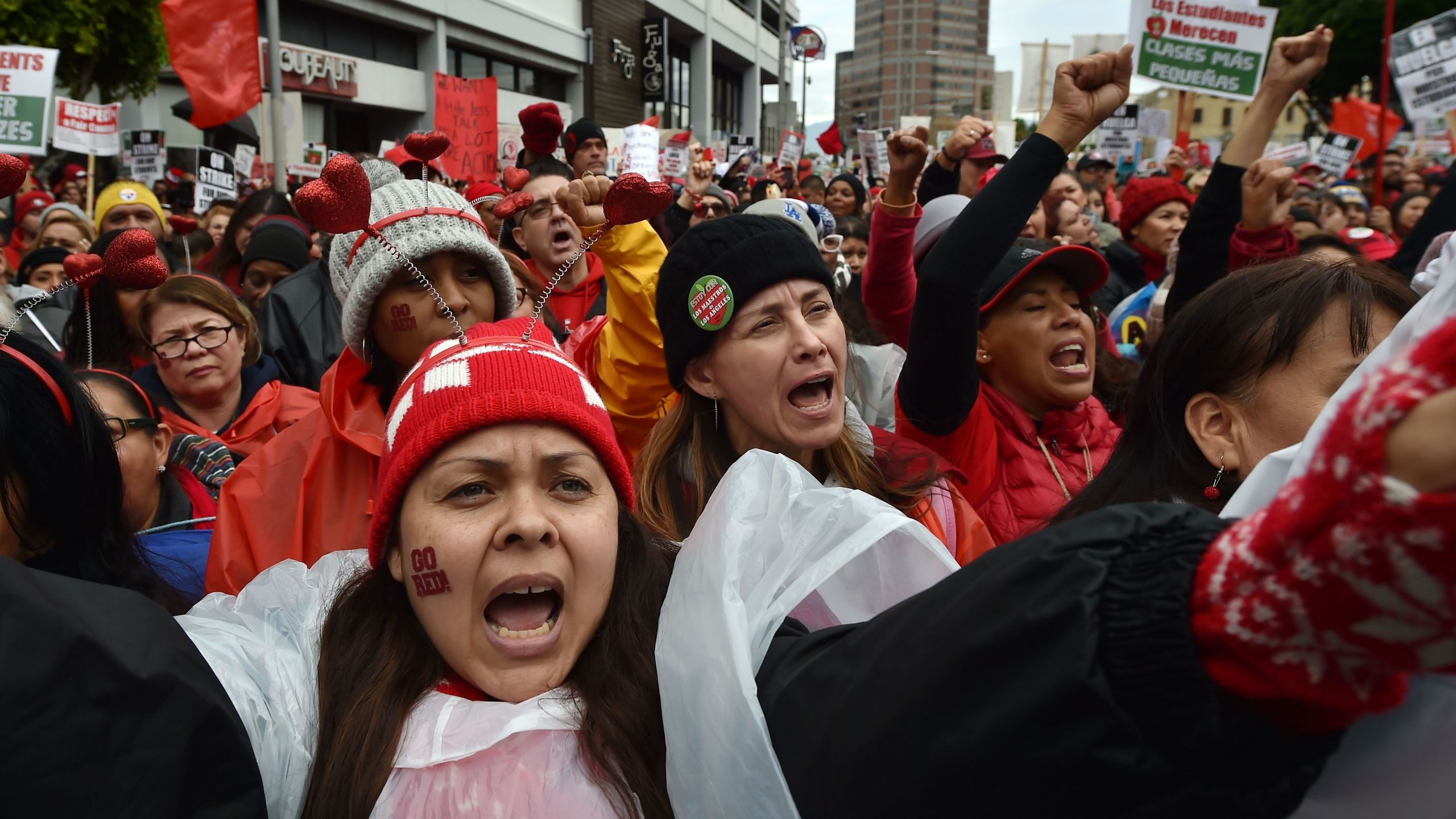 Striking teachers and their supporters rally in downtown Los Angeles on the second day of the teachers strike on Jan. 15, 2019. (Credit: Robyn Beck / AFP / Getty Images)