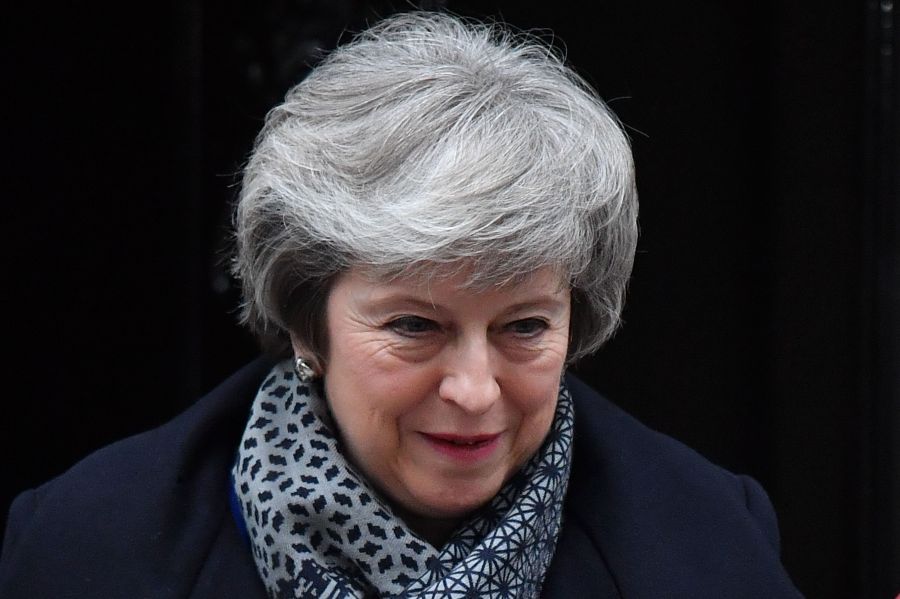 Britain's Prime Minister Theresa May leaves 10 Downing Street in London on January 16, 2019 ahead of Prime Minister's Questions (PMQs) to be followed by a debate and vote on a motion of no confidence in the government. (Credit: BEN STANSALL/AFP/Getty Images)