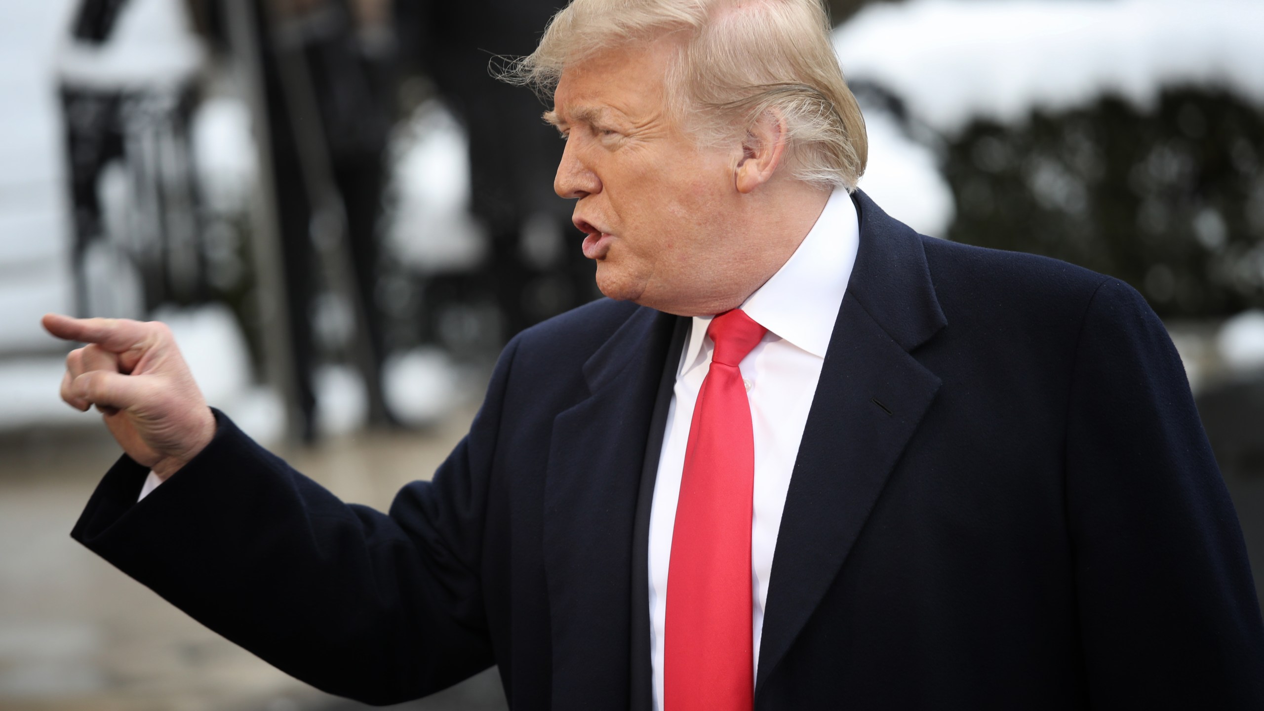 U.S. President Donald Trump answers questions from the press as he departs the White House January 14, 2019 in Washington, DC. (Credit: Win McNamee/Getty Images)