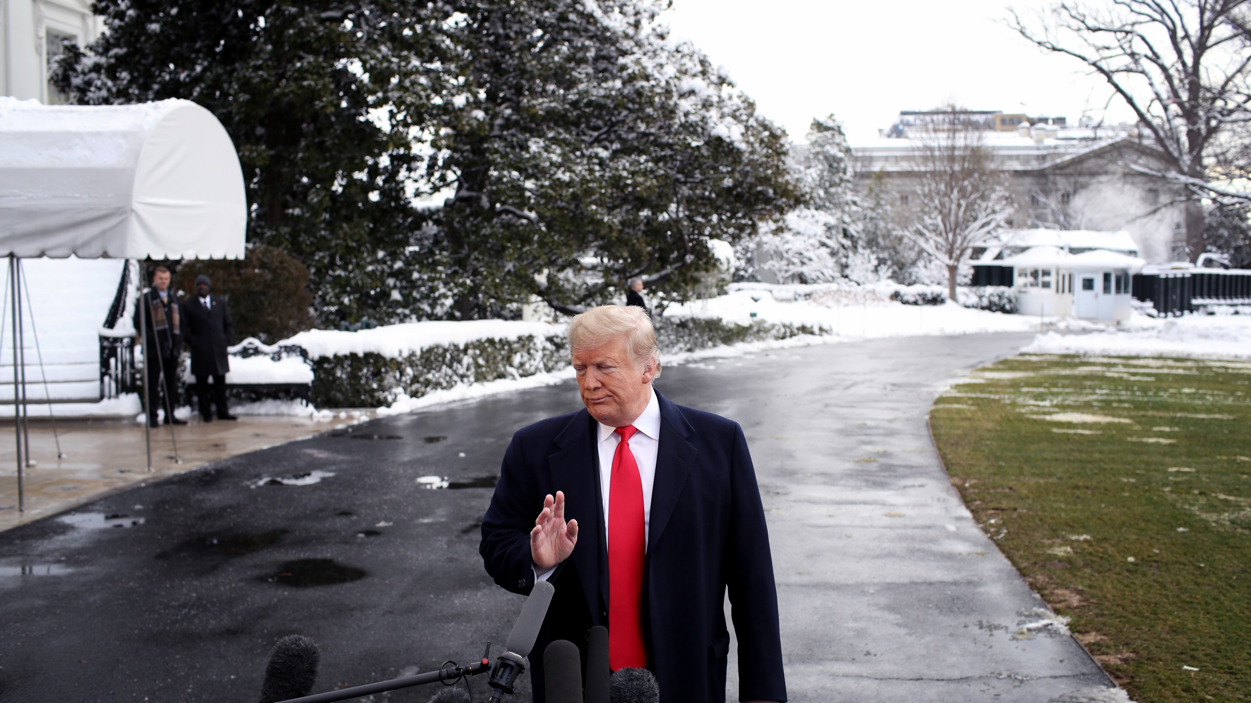 Donald Trump answers questions from the press as he departs the White House on Jan. 14, 2019. (Credit: Win McNamee/Getty Images)