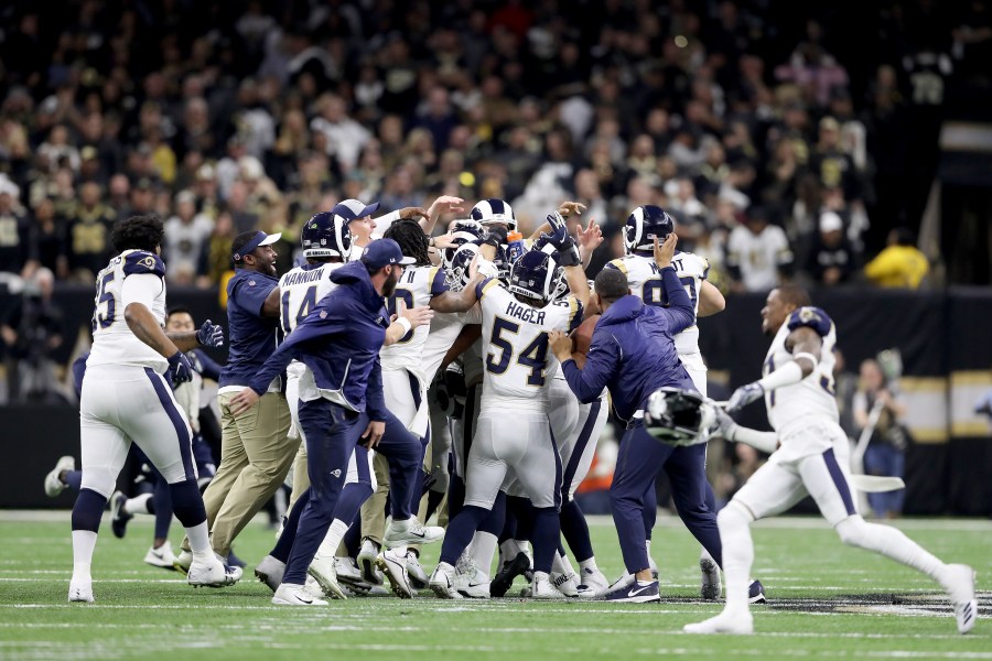 Johnny Hekker #6 and Greg Zuerlein #4 of the Los Angeles Rams celebrate after kicking the game winning field goal in overtime against the New Orleans Saints in the NFC Championship game at the Mercedes-Benz Superdome on January 20, 2019 in New Orleans. (Credit: Streeter Lecka/Getty Images)