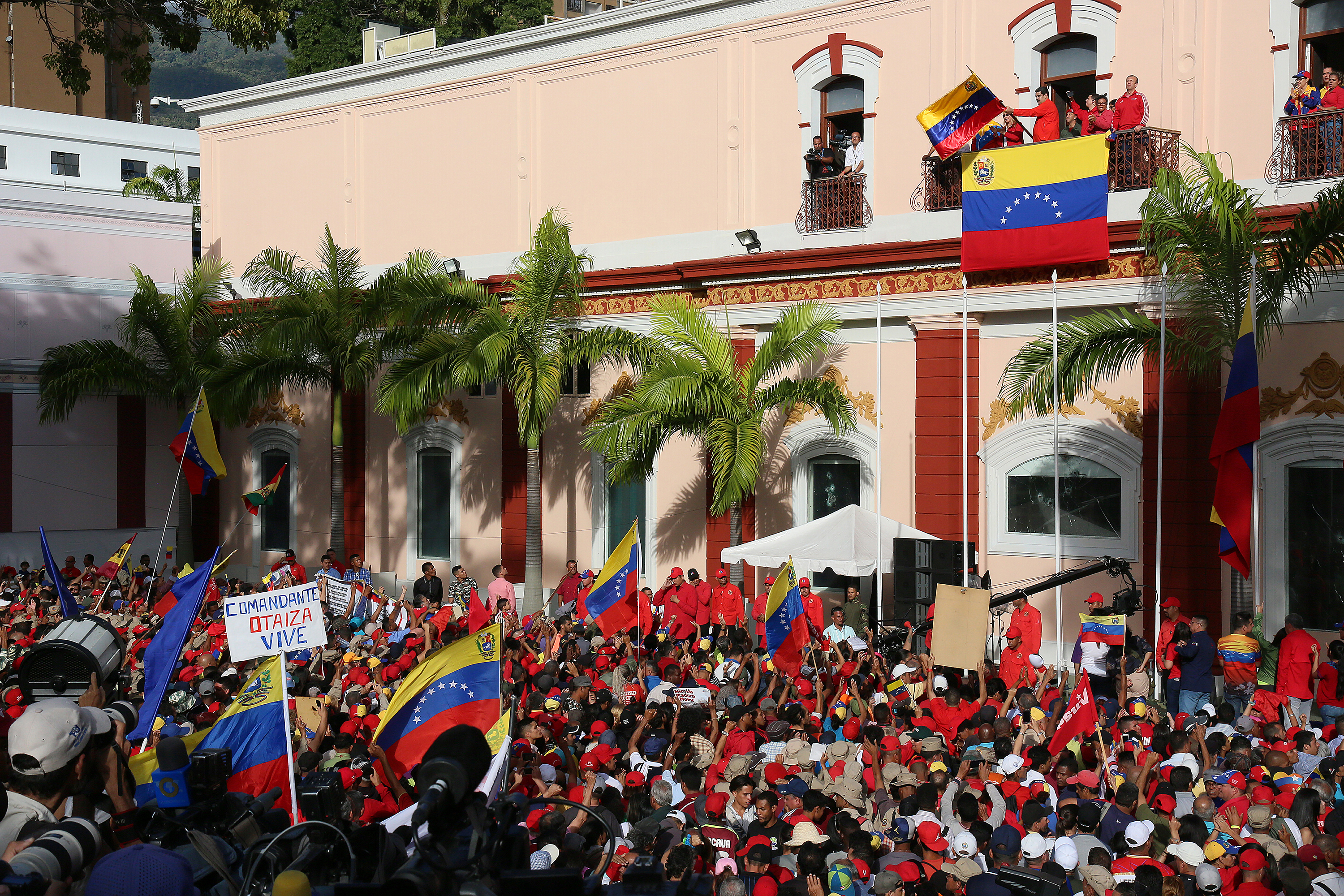 President of Venezuela Nicolás Maduro (center) gives a speech to his supporters form the Balcón del Pueblo of the Miraflores Government Palace on Jan. 23, 2019. (Credit: Edilzon Gamez/Getty Images)