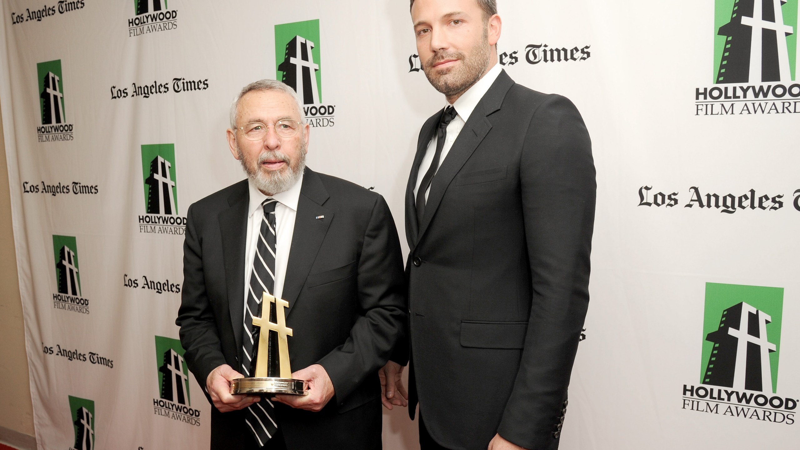 Actor Ben Affleck (R), winner of the Hollywood Ensemble Acting Award, poses with former CIA Officer Tony Mendez during the 16th Annual Hollywood Film Awards Gala presented by The Los Angeles Times held at The Beverly Hilton Hotel on October 22, 2012 in Beverly Hills, California. (Credit: Jason Merritt/Getty Images)