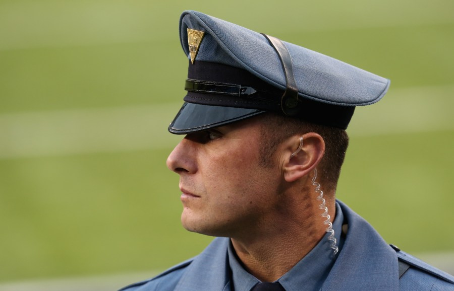 A New Jersey State Trooper looks on before the Seattle Seahawks take on the Denver Broncos during Super Bowl XLVIII at MetLife Stadium on February 2, 2014 in East Rutherford, New Jersey. (Credit: Stephen Dunn/Getty Images)