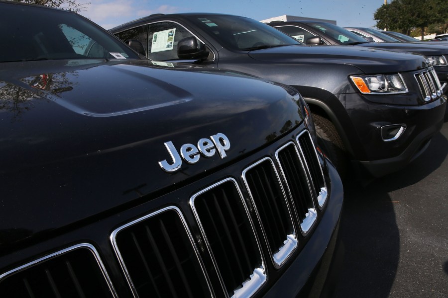 Jeep Grand Cherokee vehicles are seen on a sales lot on April 22, 2016, in Miami, Florida. (Credit: Joe Raedle/Getty Images)