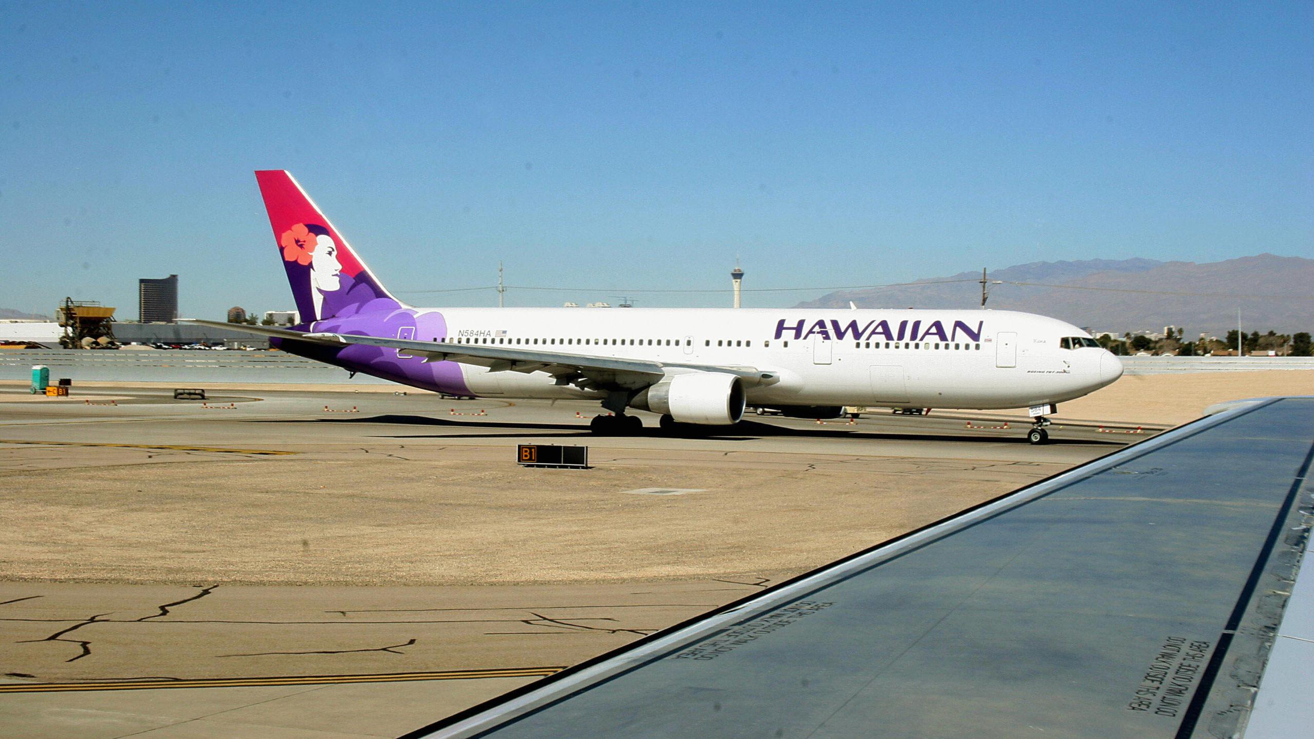 A Hawaiian Airlines plane is seen in a file photo. (Credit: KAREN BLEIER/AFP/Getty Images)