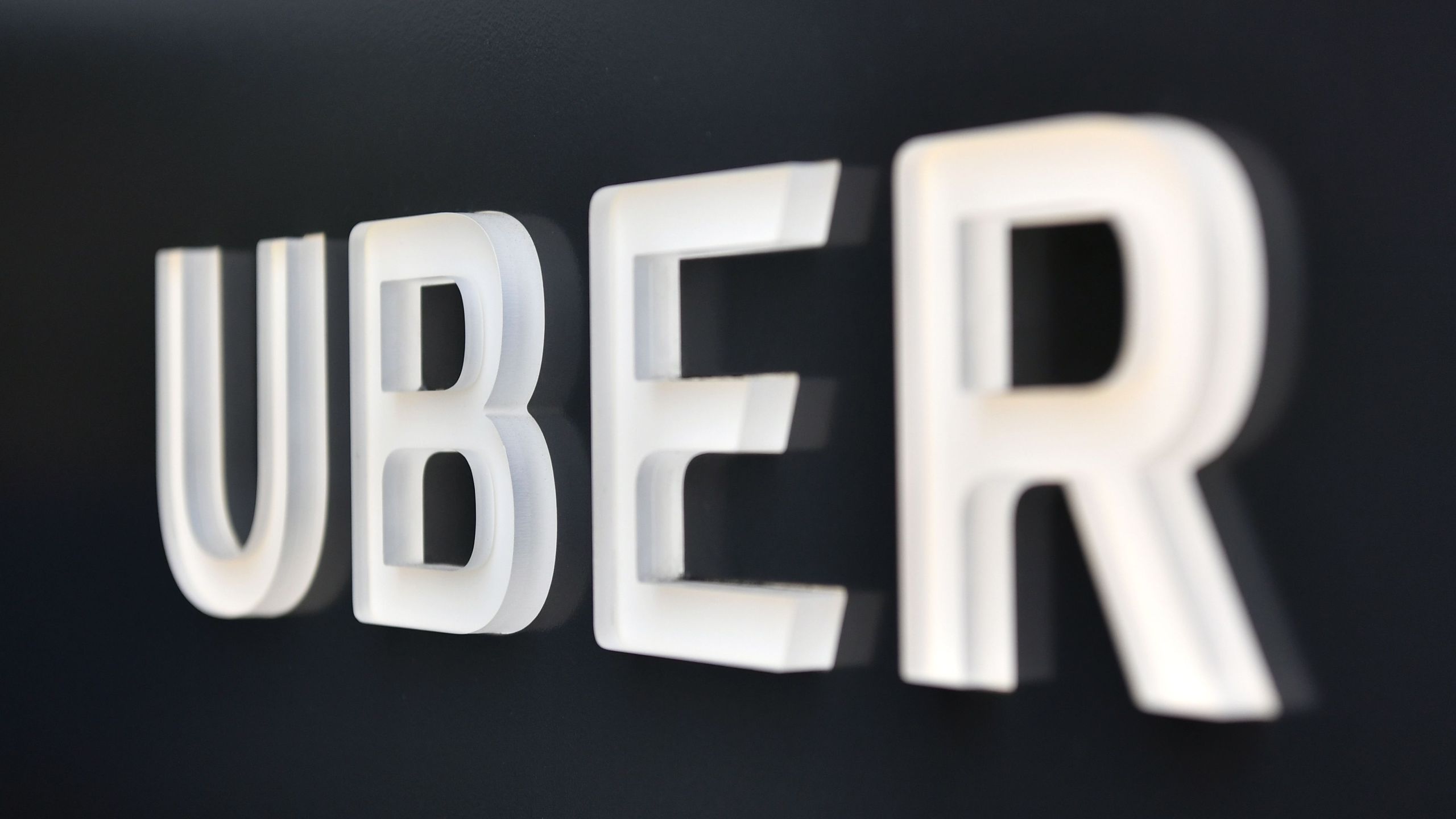 The Uber logo is seen outside the Uber Corporate Headquarters building in San Francisco, California on Feb. 5, 2018. (Credit: JOSH EDELSON/AFP/Getty Images)