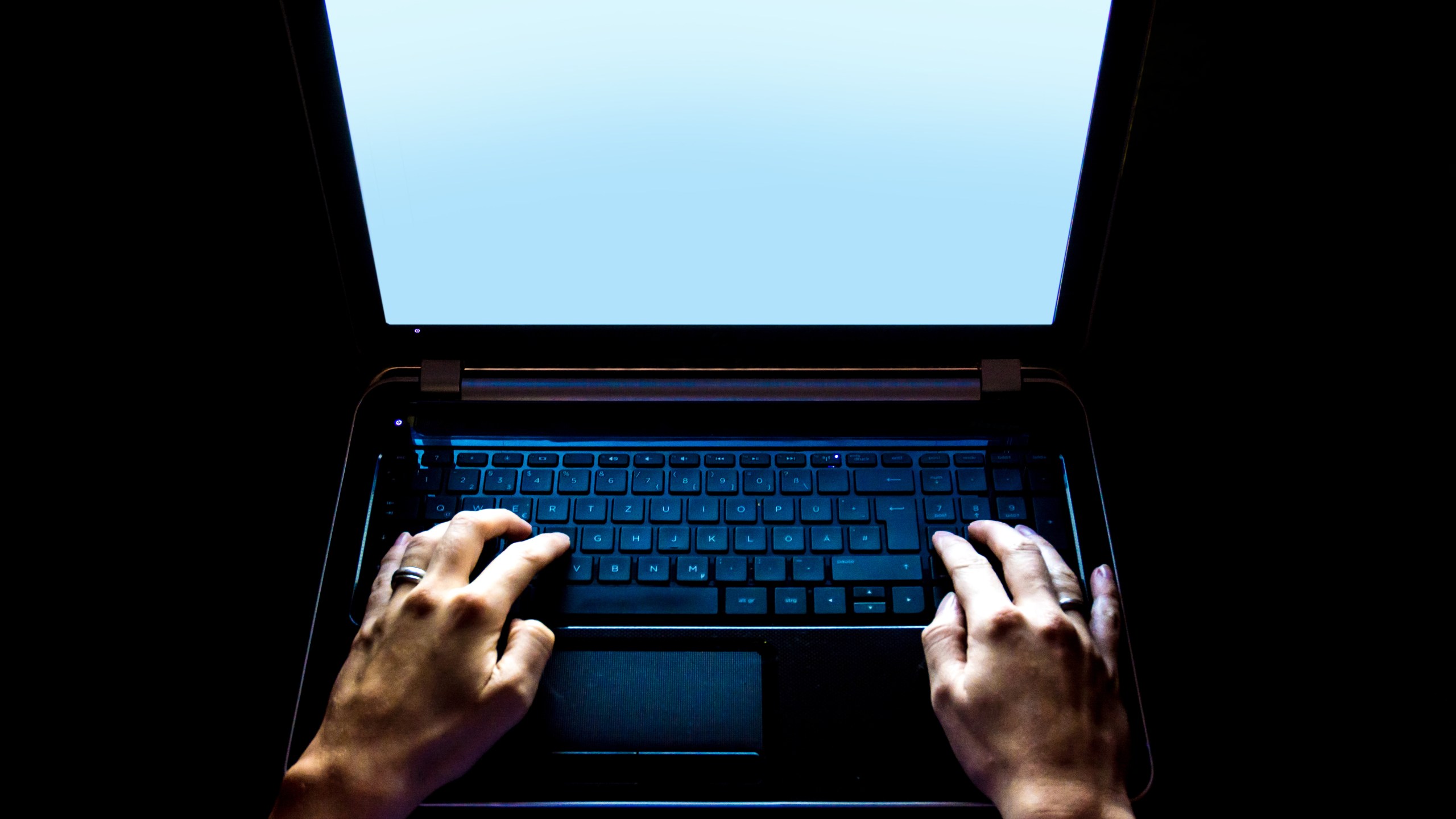 A file image shows a person using a laptop. (Credit: iStock / Getty Images Plus)