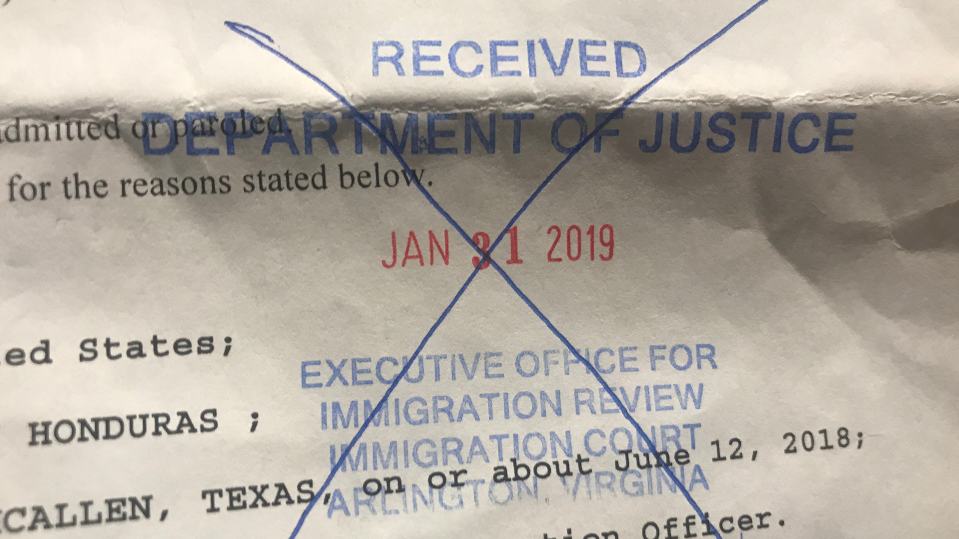 Officials at an immigration court in Virginia stamped immigrants' paperwork to acknowledge they appeared to unscheduled court dates on Jan. 31, 2019. (Credit: Catherine E. Shoichet/CNN)