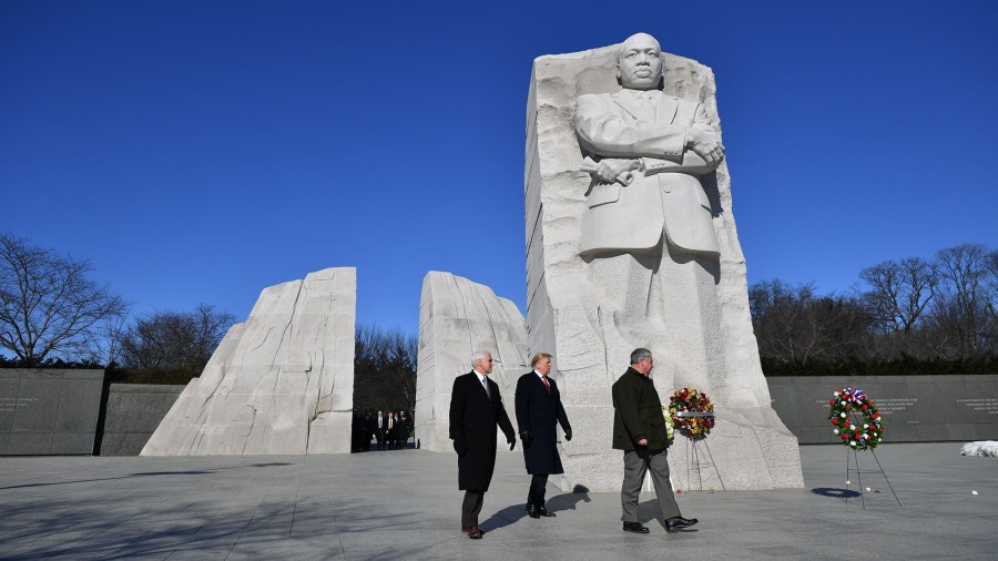 President Donald Trump and Vice President Mike Pence visit the Martin Luther King Jr. Memorial in Washington, DC on Martin Luther King Day on January 21, 2019. (Credit: MANDEL NGAN/AFP/Getty Images)