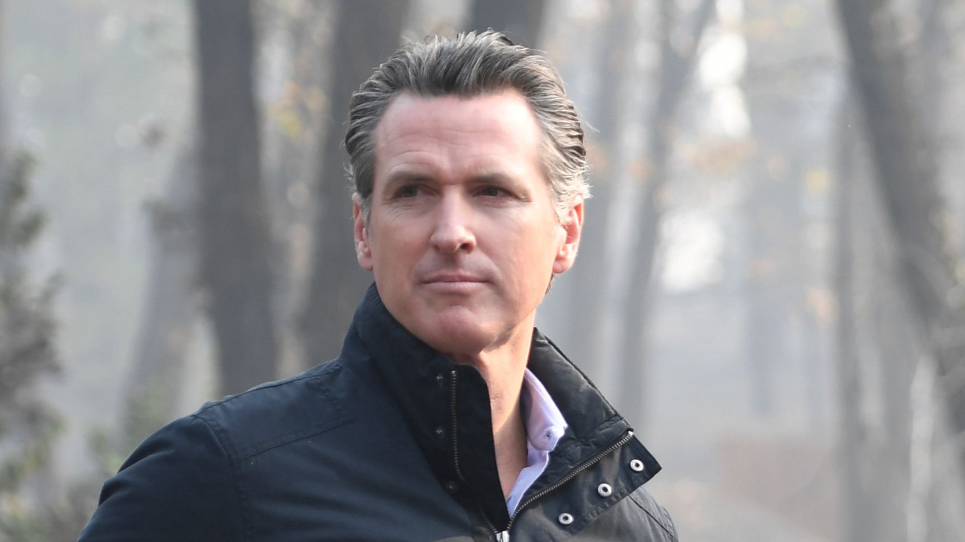 Then-Lt. Gov. Gavin Newsom views damage from wildfires in Paradise, Calif. on Nov. 17, 2018. (Credit: SAUL LOEB/AFP/Getty Images)