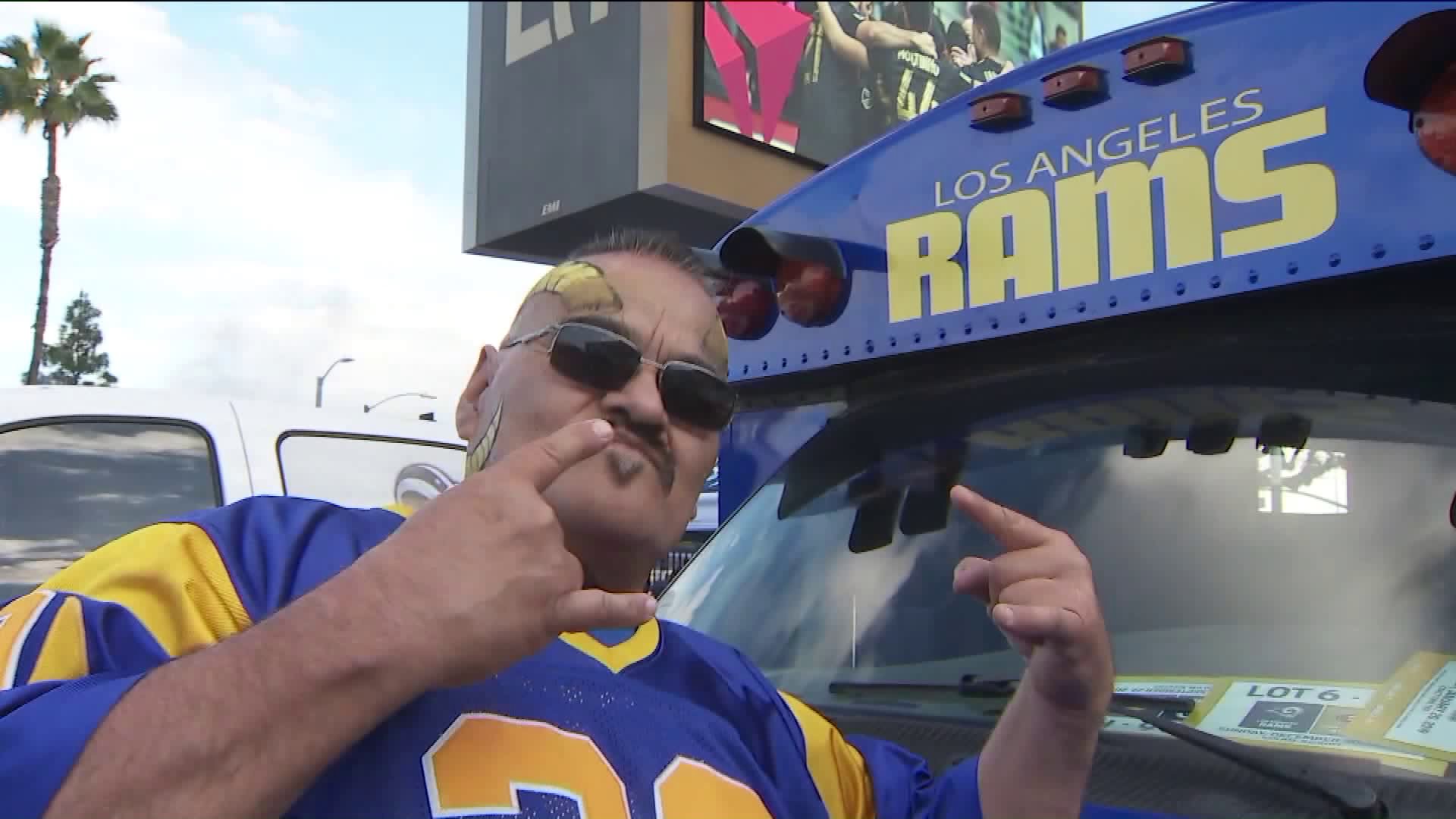 Los Angeles Rams fans support their team during a playoff game against the Dallas Cowboys at the L.A. Memorial Coliseum on Jan. 12, 2019.