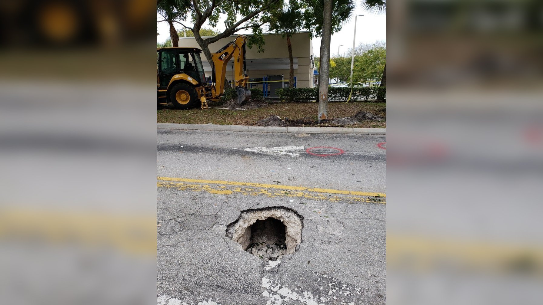 Public works employees discovered a tunnel leading toward a Chase bank in a Pembroke Pines, Florida. (Credit: FBI Miami)