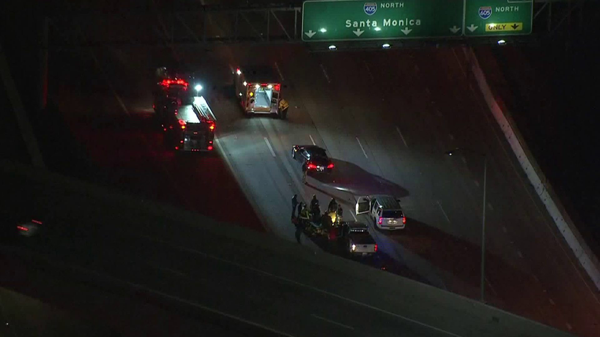 The scene of a crash involving a motorcycle officer in an area of the 405 Freeway where it meets the 605 is seen in this footage from the morning of Feb. 21, 2019. (Credit: KTLA)