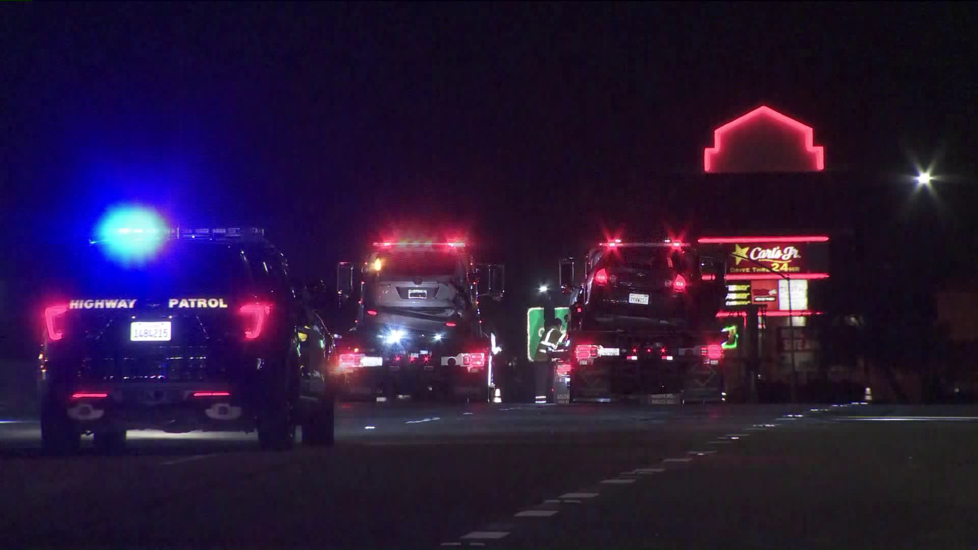 Crews tow away a vehicle as officials respond to a crash on the 60 Freeway east of the 605 on Feb. 19, 2019. (Credit: KTLA)