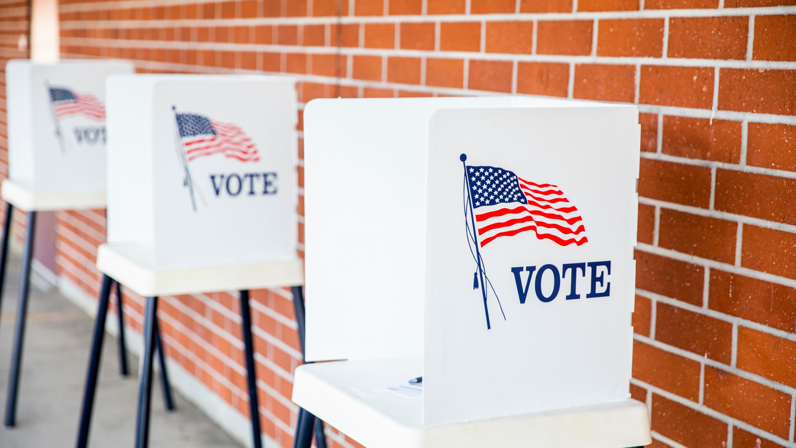 A polling location station is seen in a file photo. (Credit: iStock / Getty Images Plus)