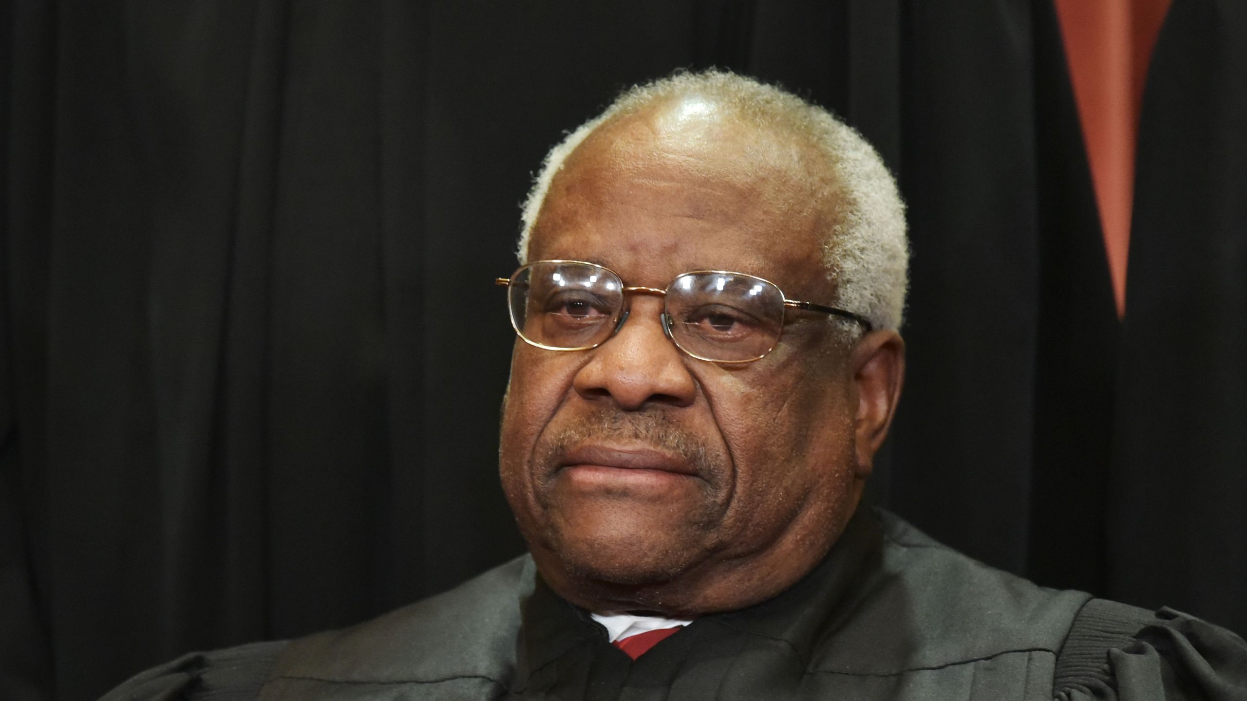 Associate Justice Clarence Thomas poses for the official group photo at the U.S. Supreme Court on November 30, 2018. (Credit: MANDEL NGAN/AFP/Getty Images)