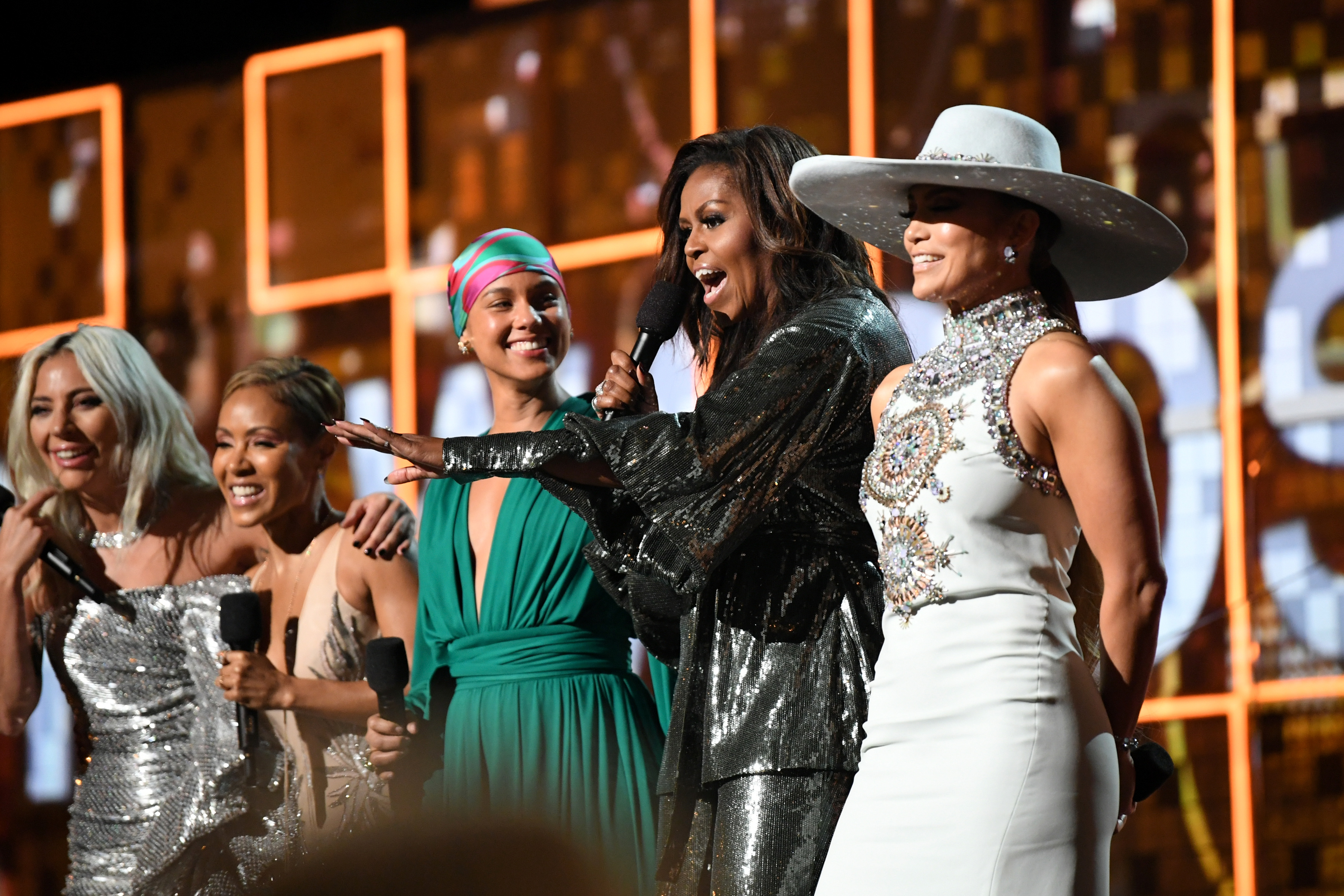 (L-R) Lady Gaga, Jada Pinkett Smith, Alicia Keys, Michelle Obama, and Jennifer Lopez speak onstage during the 61st Annual GRAMMY Awards at Staples Center on February 10, 2019 in Los Angeles, California. (Credit: Emma McIntyre/Getty Images for The Recording Academy)