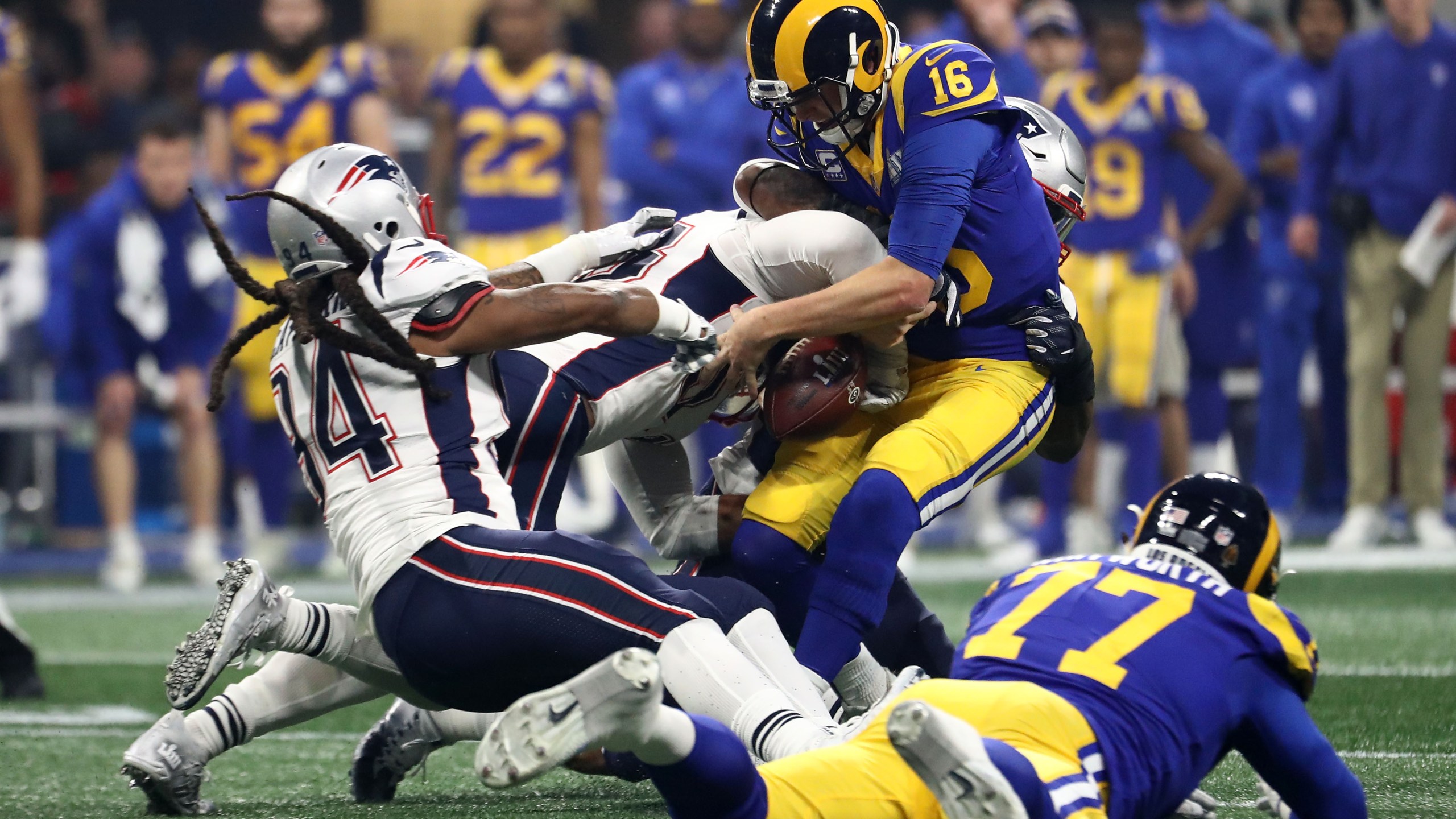 Jared Goff of the Los Angeles Rams, is sacked by Kyle Van Noy and Dont'a Hightower of the New England Patriots in the second half during Super Bowl LIII at Mercedes-Benz Stadium in Atlanta on Feb. 3, 2019. (Credit: Al Bello / Getty Images)