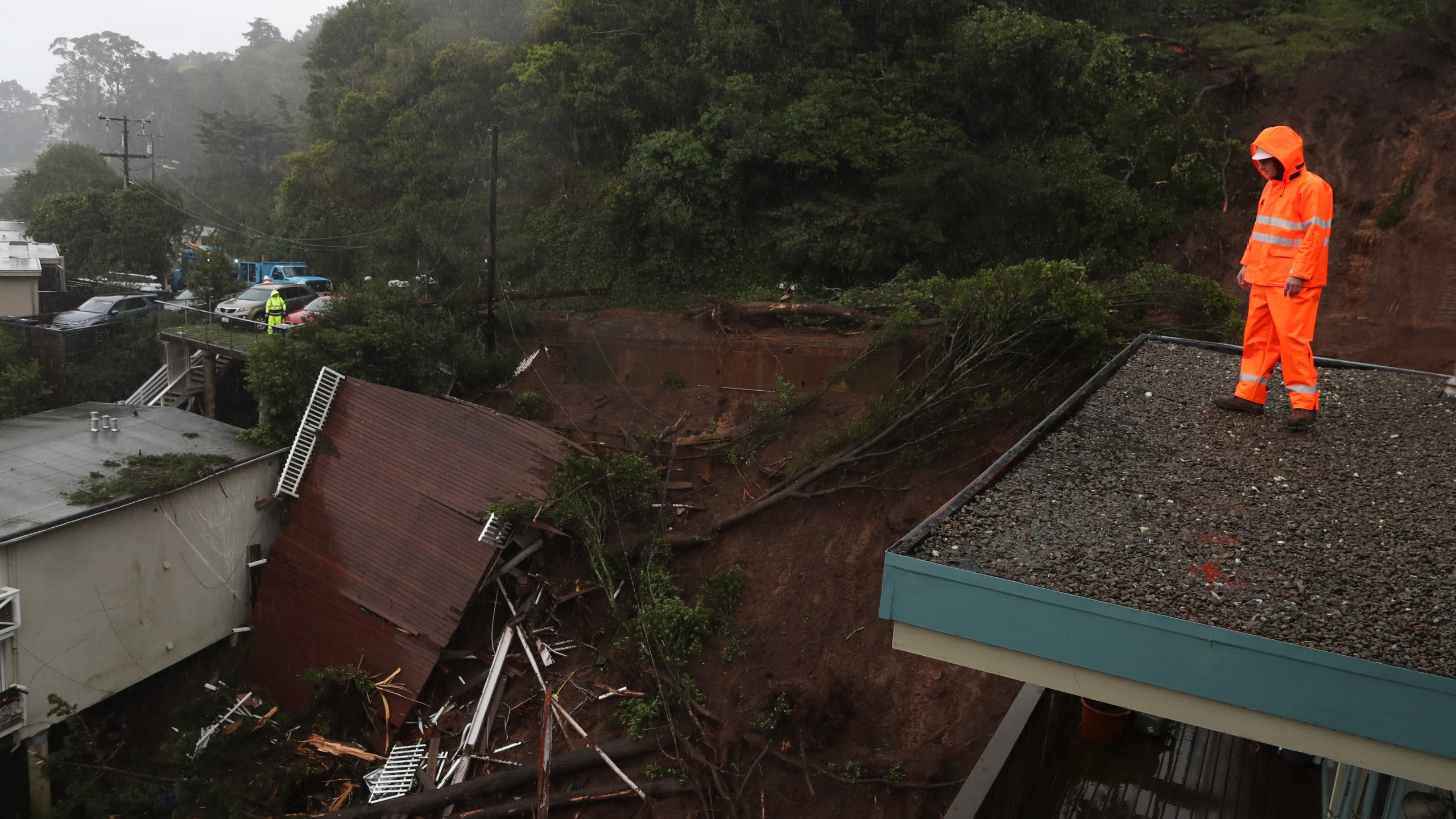 A view of the roof of a home that was swept down a hill by a mudslide during a rain storm on February 14, 2019 in Sausalito, California. (Credit: Justin Sullivan/Getty Images)