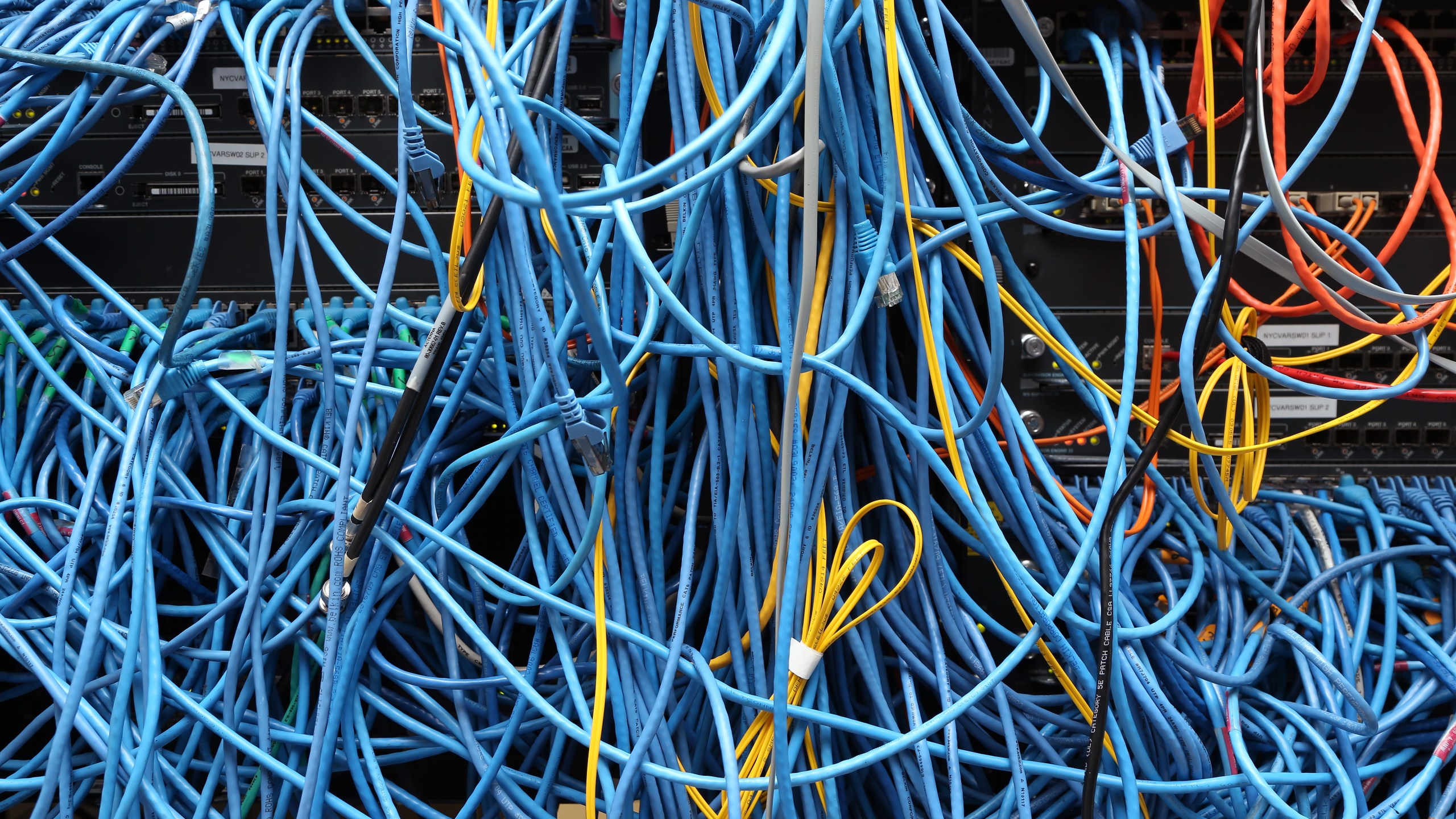 Network cables are plugged in a server room on Nov. 10, 2014, in New York City. (Credit: Michael Bocchieri / Getty Images)