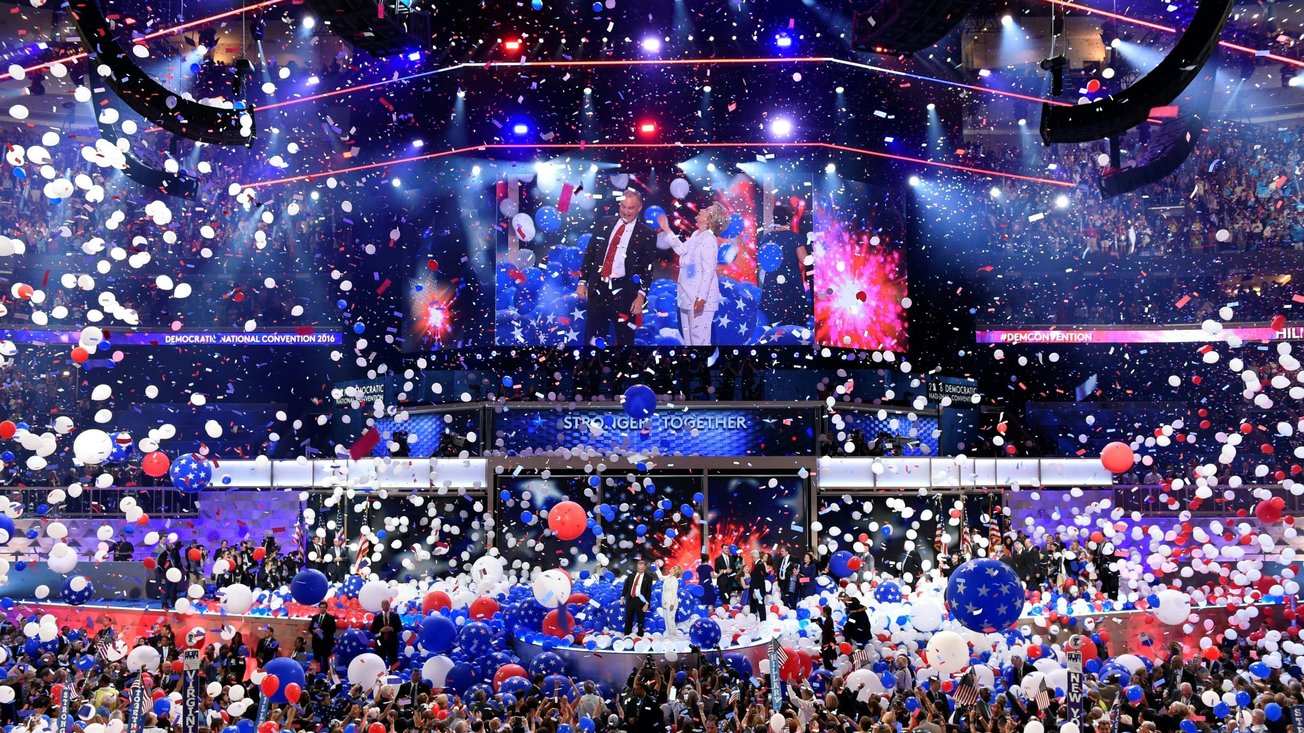 Balloons come down on Democratic presidential nominee Hillary Clinton and running mate Tim Kaine at the end of the fourth and final night of the Democratic National Convention at Wells Fargo Center on July 28, 2016, in Philadelphia, Penn. (SAUL LOEB/AFP/Getty Images)