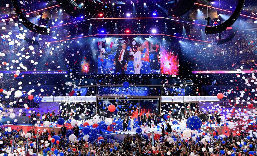 Balloons come down on Democratic presidential nominee Hillary Clinton and running mate Tim Kaine at the end of the fourth and final night of the Democratic National Convention at Wells Fargo Center on July 28, 2016, in Philadelphia, Penn. (SAUL LOEB/AFP/Getty Images)