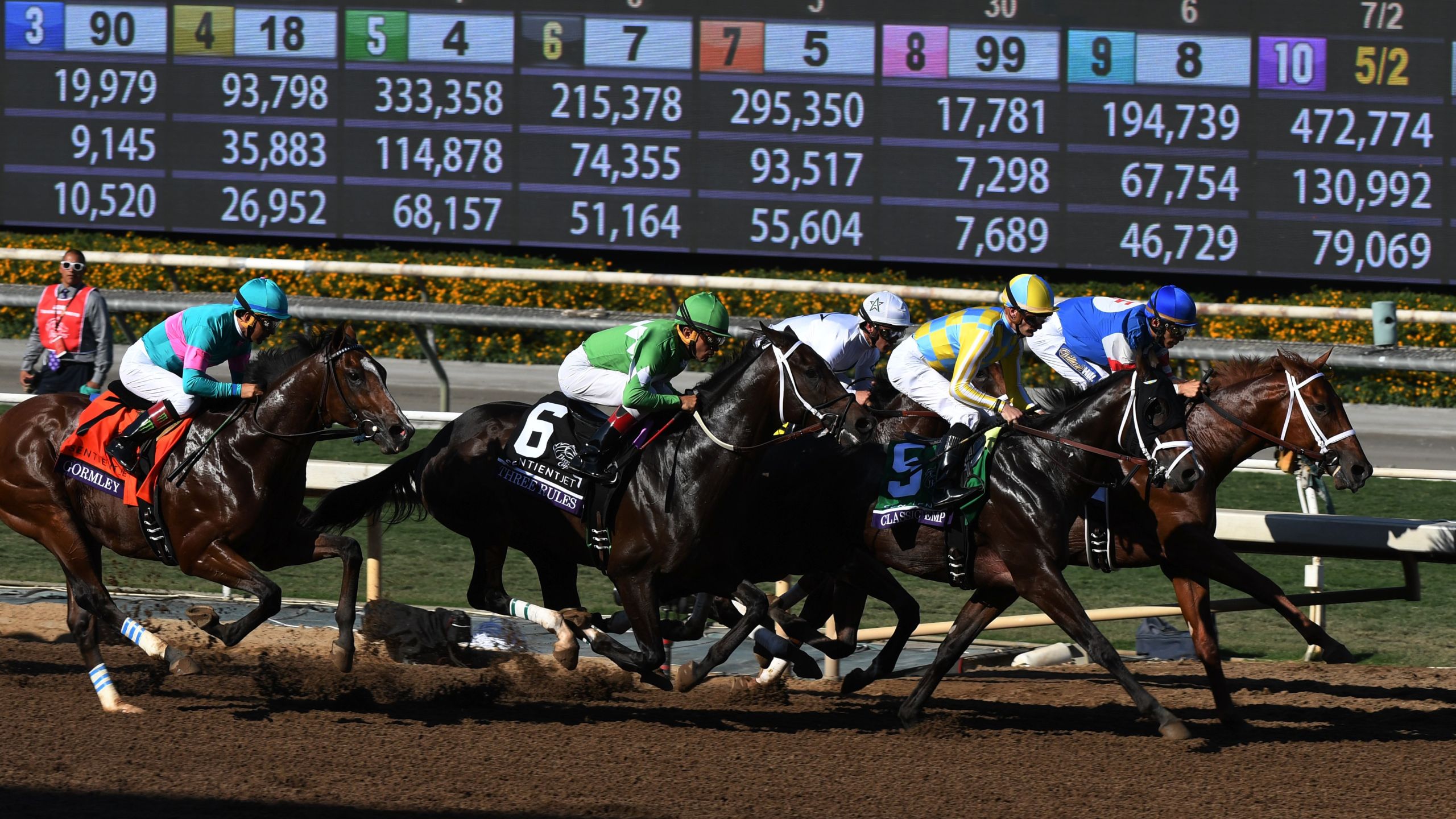 Horses dash at the start of the Sentient Jet Breeders' Cup Juvenile race during the 2016 Breeders' Cup World Championships at the Santa Anita racetrack in Arcadia on Nov. 5, 2016. (Credit: MARK RALSTON/AFP/Getty Images)