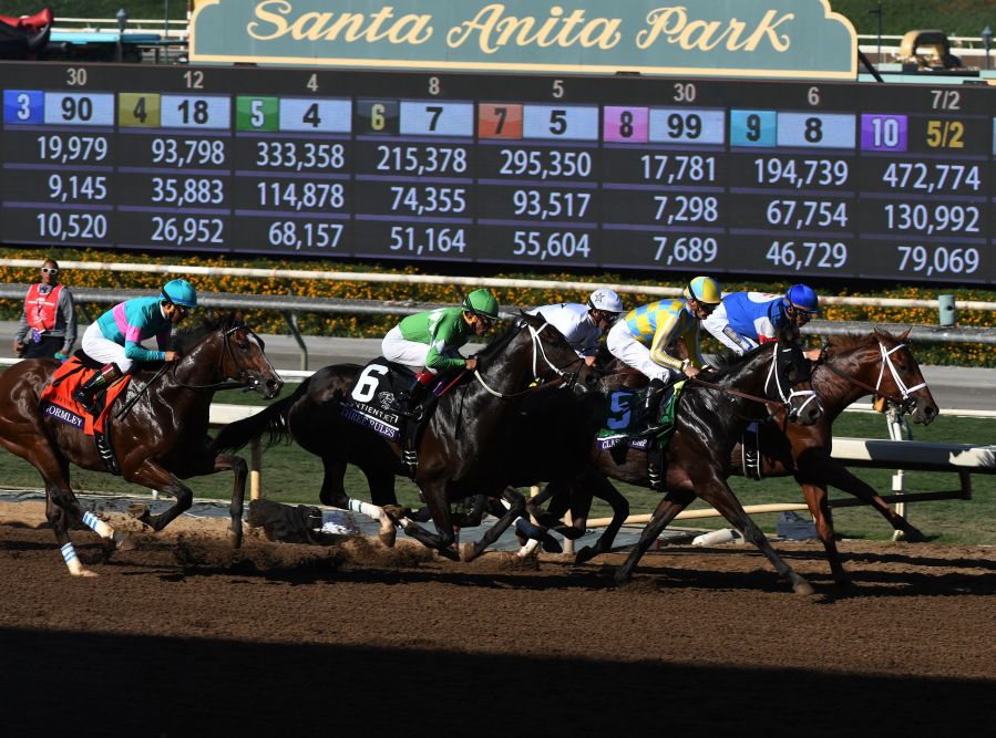 Horses dash at the start of the Sentient Jet Breeders' Cup Juvenile race during the 2016 Breeders' Cup World Championships at the Santa Anita racetrack in Arcadia on Nov. 5, 2016. (Credit: MARK RALSTON/AFP/Getty Images)