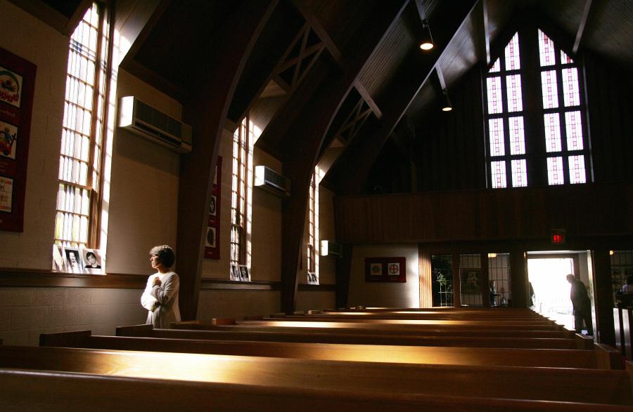 Reverend Leigh Anne Taylor prepares for Sunday morning church services at Blacksburg United Methodist Church in Blacksburg, Virginia. (Credit: TIM SLOAN/AFP/Getty Images)