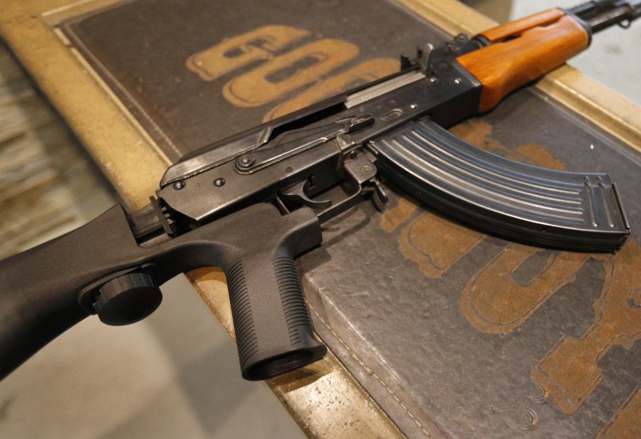 A bump stock is installed on an AK-47 with a 30 round magazine at Good Guys Gun and Range on February 21, 2018 in Orem, Utah. (Credit: George Frey/Getty Images)