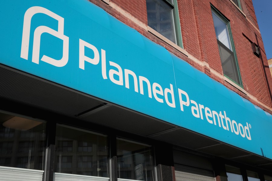 A sign hangs above a Planned Parenthood clinic on May 18, 2018, in Chicago. (Scott Olson/Getty Images)