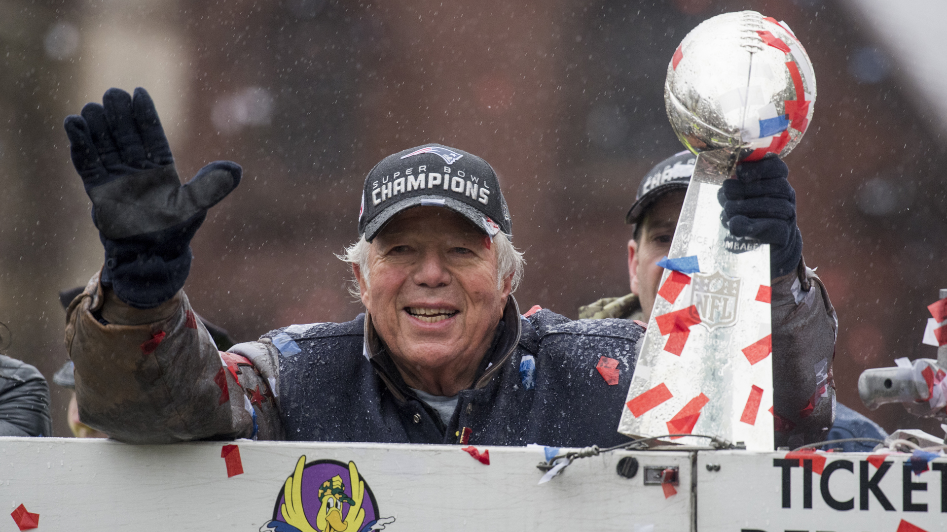 New England Patriots owner Robert Kraft waves to the crowd during a Super Bowl victory parade on February 7, 2017 in Boston. (Credit: Michael J. Ivins/Getty Images)