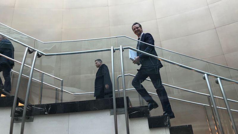 California Gov. Gavin Newsom races between meetings at the National Governors Assn. conference at the Marriott Marquis hotel in Washington, D.C., on Feb. 24, 2019. (Credit: Phil Willon / Los Angeles Times)