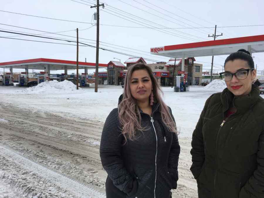 Martha Hernandez, left, and Ana Suda pose in front of a convenience store in Havre, Montana, where they say they were detained by a Border Patrol agent for speaking Spanish in this Jan. 23, 2019, photo provided by the ACLU of Montana.