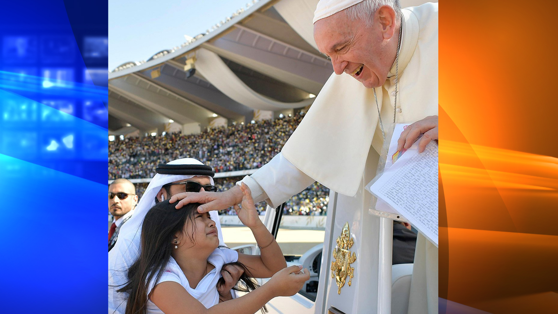 A little girl evaded tight police security inside Abu Dhabi's city stadium to run over and deliver a letter to Pope Francis on Feb. 6, 2019. (Credit: Vatican Media/REUTERS via CNN)