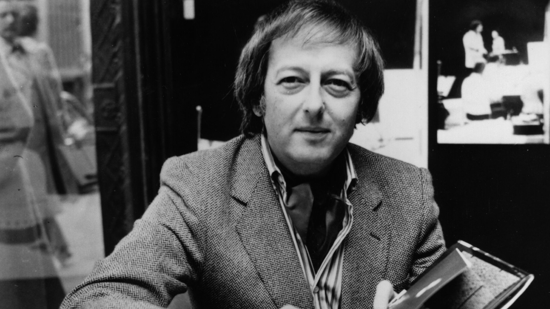 Andre Previn is seen in London signing copies of his new book 'Orchestra' and his record 'The Sound of the Orchestra', at Liberty's on Oct. 31, 1979. (Credit: Keystone/Getty Images)