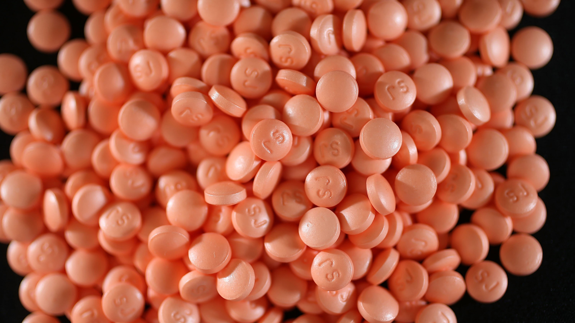 Aspirin pills are seen in a file photo. (Credit: Joe Raedle/Getty Images)