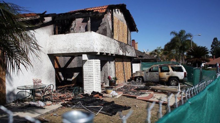 The scene at 19941 Crestknoll Drive where a Cessna airplane crashed into a home on February 6, 2019, in Yorba Linda. (Credit: Dania Maxwell / Los Angeles Times)