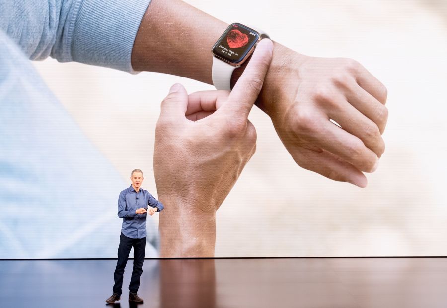 Apple COO Jeff Williams discusses Apple Watch Series 4 during an event on Sept. 12, 2018 in Cupertino. (Credit: NOAH BERGER/AFP/Getty Images)