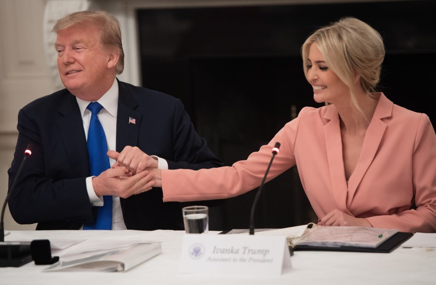 US President Donald Trump speaks alongside senior advisor and daughter Ivanka Trump (R) during the first meeting of the American Workforce Policy Advisory Board in the State Dining Room of the White House in Washington, DC, March 6, 2019. (Credit: SAUL LOEB/AFP/Getty Images)