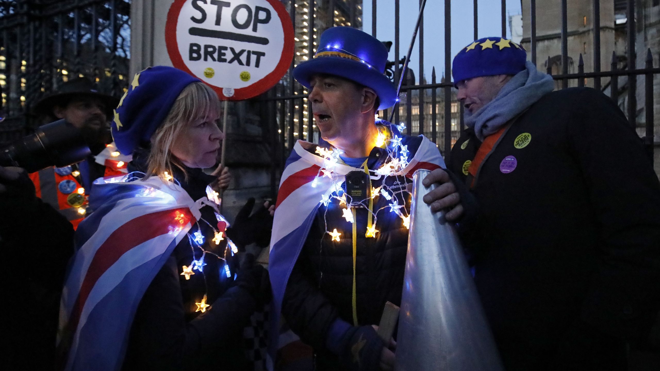 Anti-Brexit activist Steve Bray, center, and supporters protest outside the Houses of Parliament in London on March 12, 2019. (Credit: TOLGA AKMEN/AFP/Getty Images)