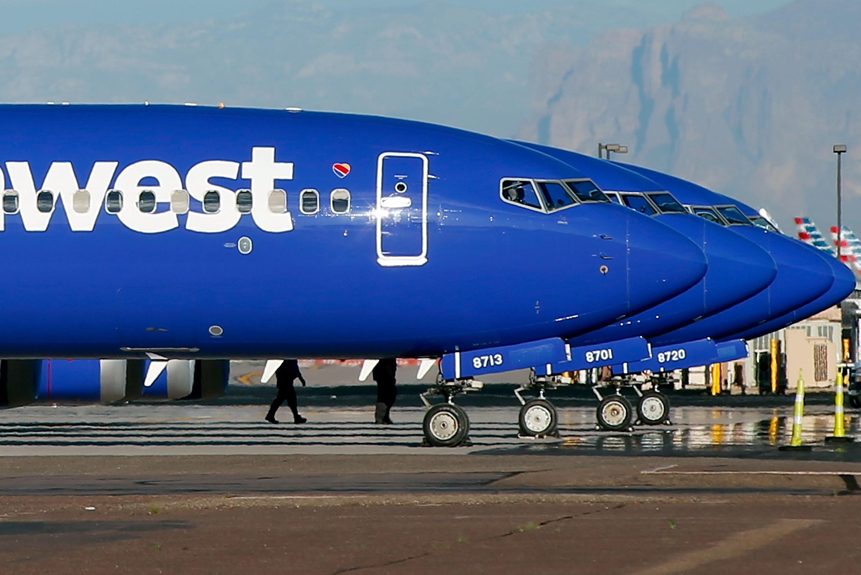 A group of Southwest Airlines Boeing 737 MAX aircraft sit on the tarmac at Phoenix Sky Harbor International Airport on March 13, 2019. (Credit: Ralph Freso / Getty Images)