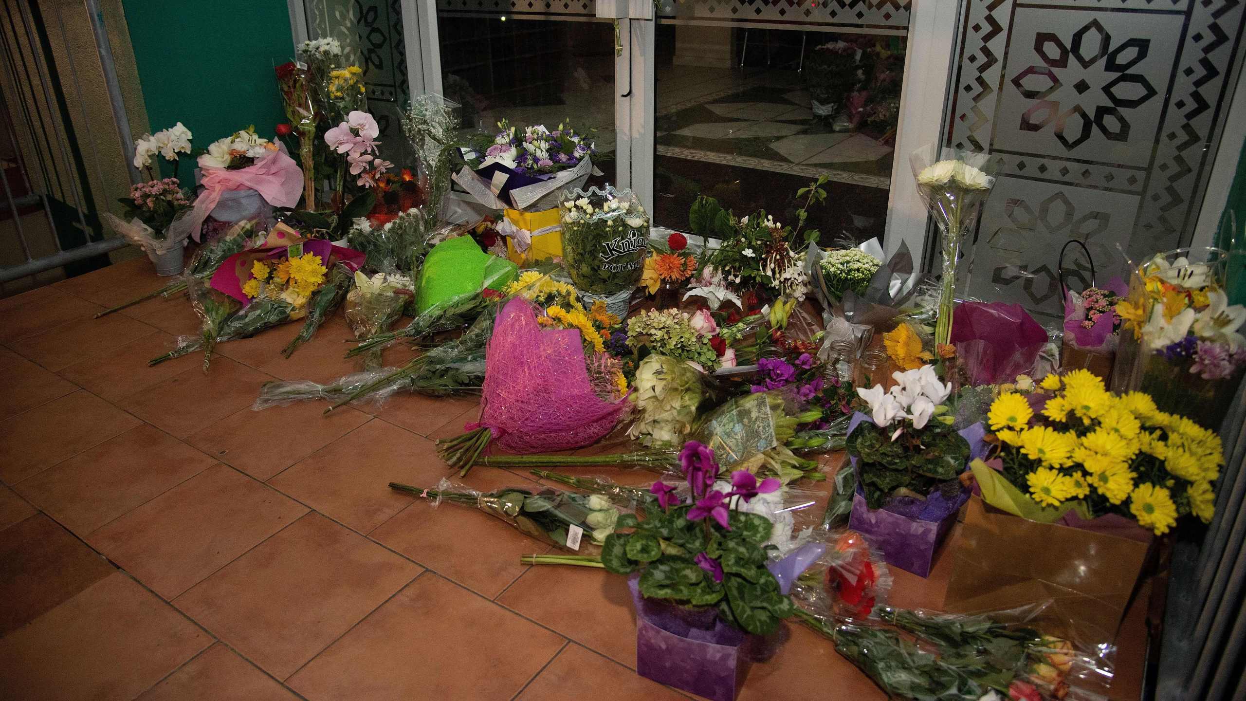 Flowers are placed on the front steps of the Wellington Masjid mosque in Kilbirnie in Wellington on March 15, 2019, after a shooting incident at two mosques in Christchurch. (Credit: MARTY MELVILLE/AFP/Getty Images)