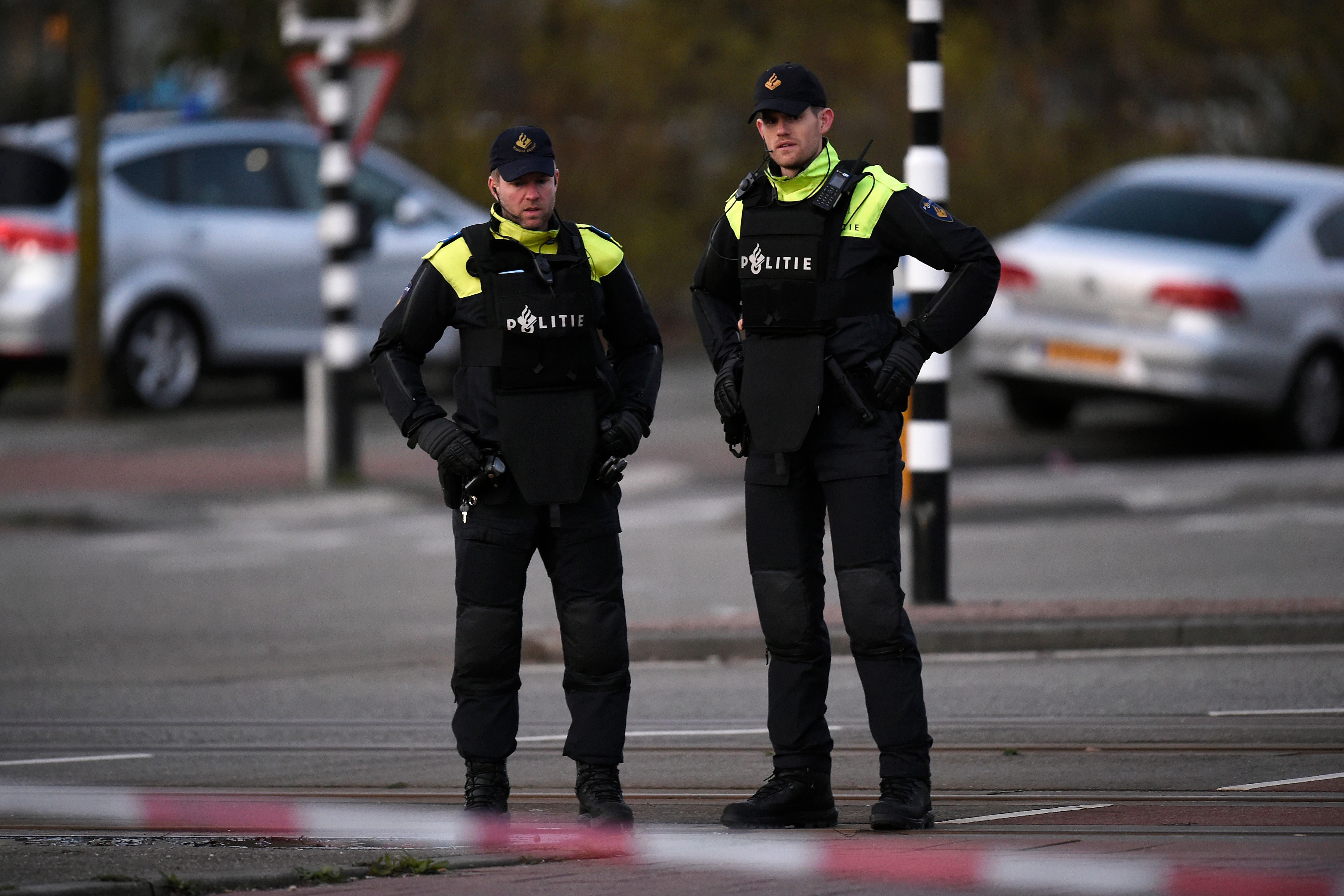 Policemen stand near a tram where a gunman opened fire killing at least three persons and wounding several in what officials said was a possible terrorist incident, on March 18, 2019 in Utrecht. (Credit: JOHN THYS/AFP/Getty Images)